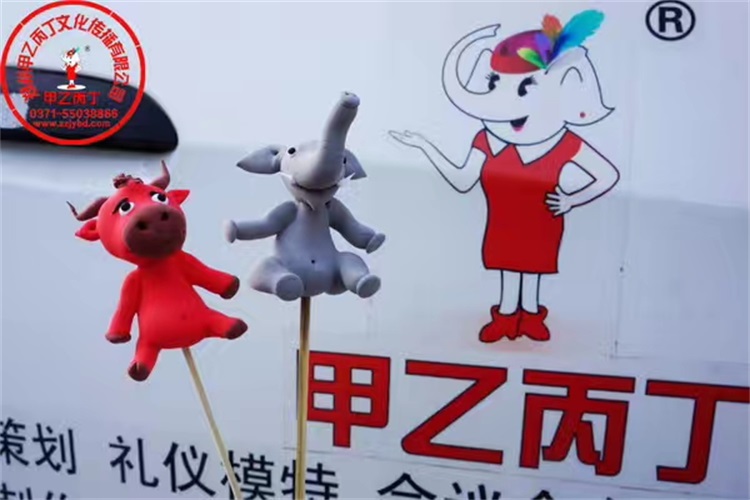 河南郑州大型开业庆典礼仪活动策划公司甲乙丙丁中原银行面人糖画民俗闹新春现场甲乙丙丁庆典礼仪公司.jpg